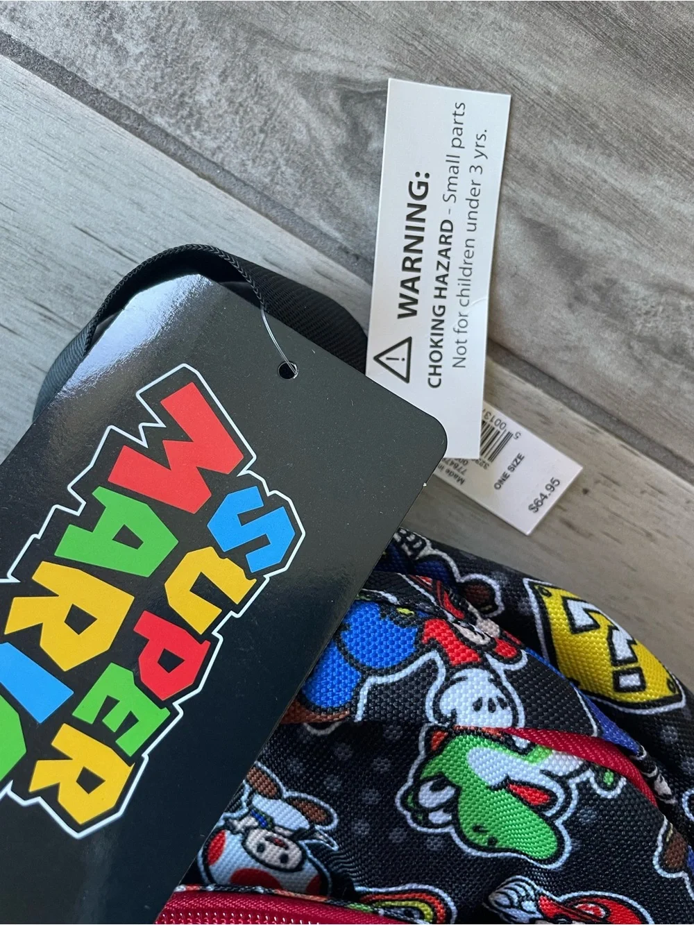 Nintendo Black Kids Backpack with Multicolor Mario Print and Red Trim